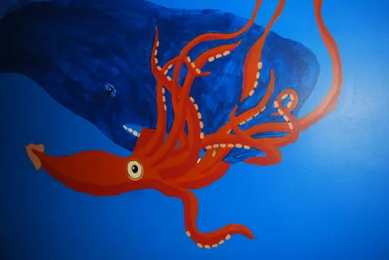 Wall mural of sperm whale battling giant squid