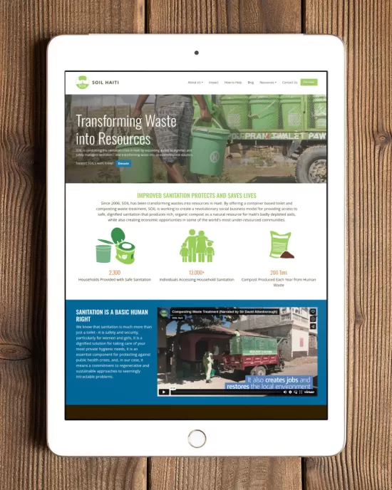 New oursoil.org website displayed on an ipad