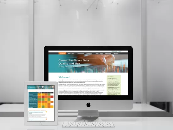 Policy Benchmark Tool website shown on two devices